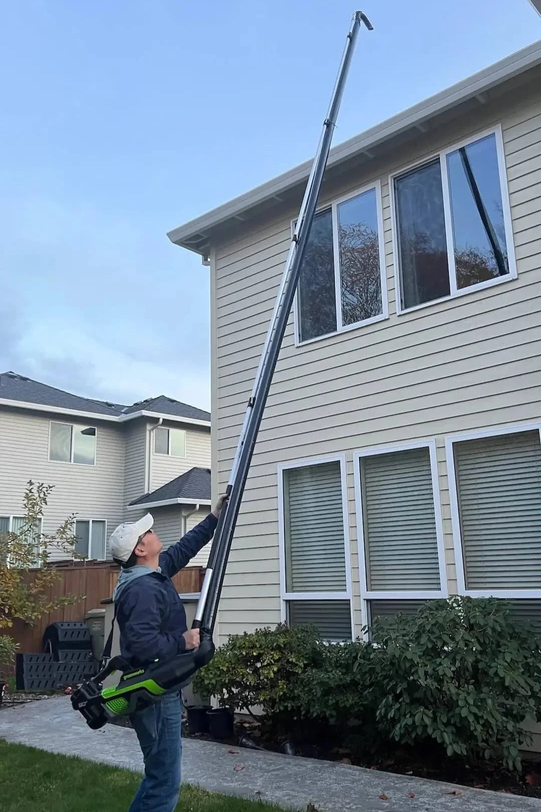leaf blower attachment to clean gutter and downspout from the ground, no ladder needed